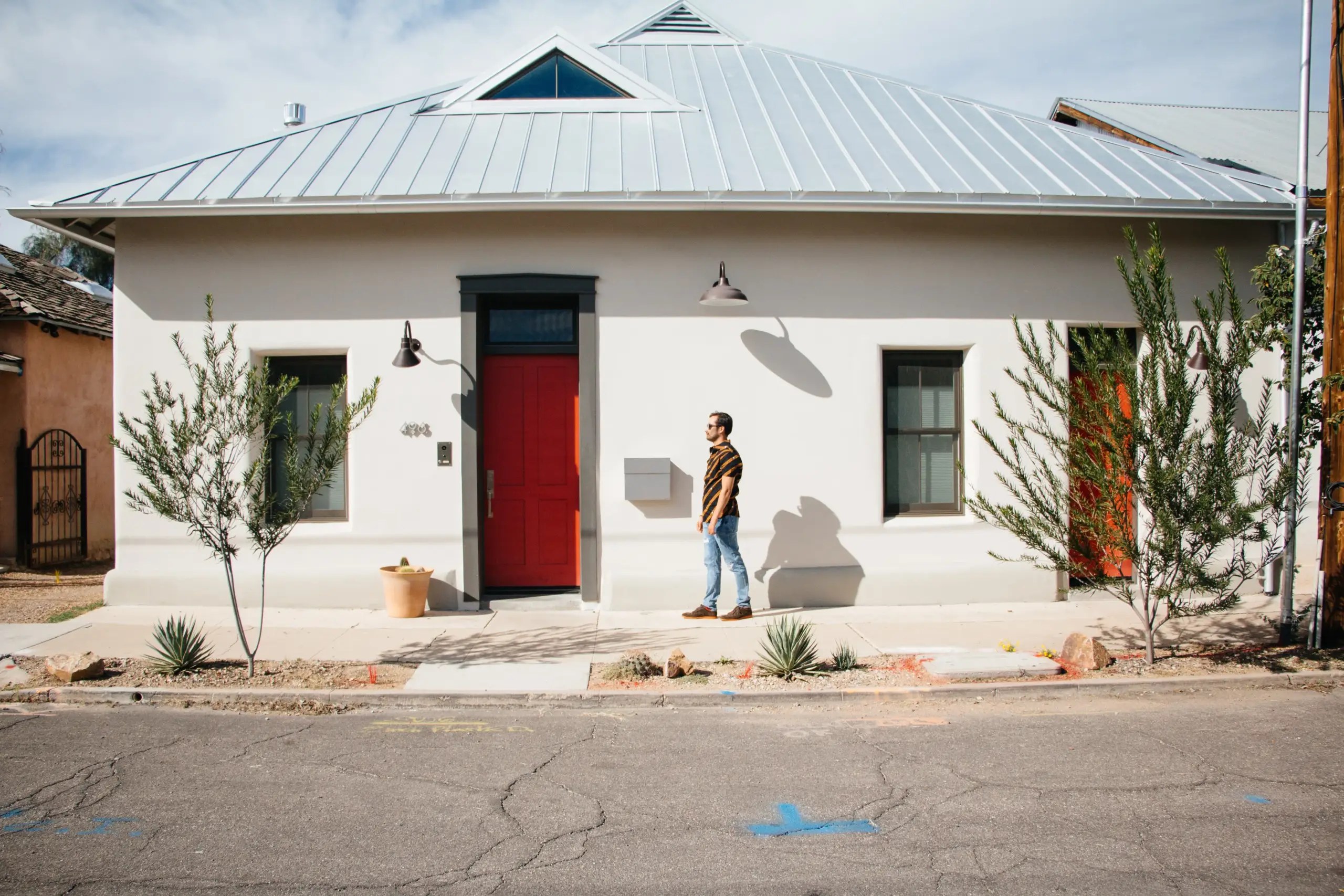 Man standing in front of a Tucson Arizona home